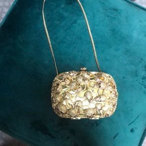 gold skull clutch